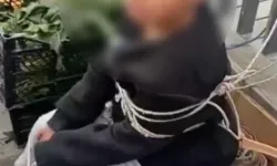 Pazardan eşofman çalan çocuğu esnaf iple bağladı!