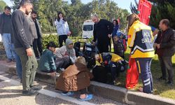 Motorlu bisiklet takla attı, 2 kişi yaralandı