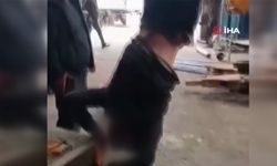 Zihinsel engelliyi ayağından bağlayıp vince astılar