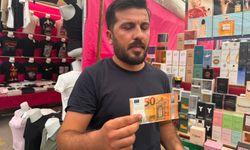 Sahte döviz ve altınlarla alışveriş yapmaya çalıştı, yakalandı