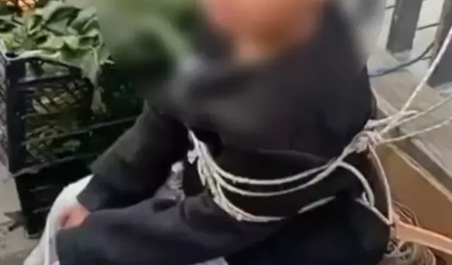Pazardan eşofman çalan çocuğu esnaf iple bağladı!