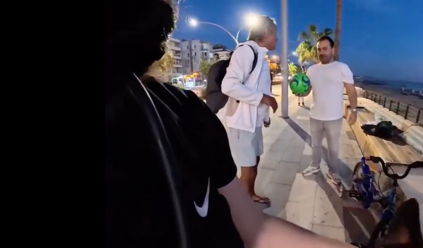 Turist kadının köpeğinden rahatsız oldu, kesmekle tehdit etti