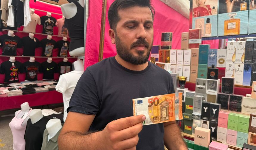 Sahte döviz ve altınlarla alışveriş yapmaya çalıştı, yakalandı
