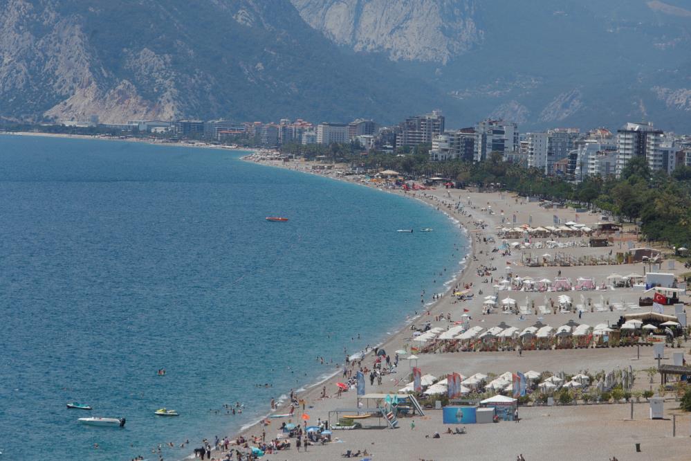 Yagmurdindiantalyadagunesigorendenizegirdi